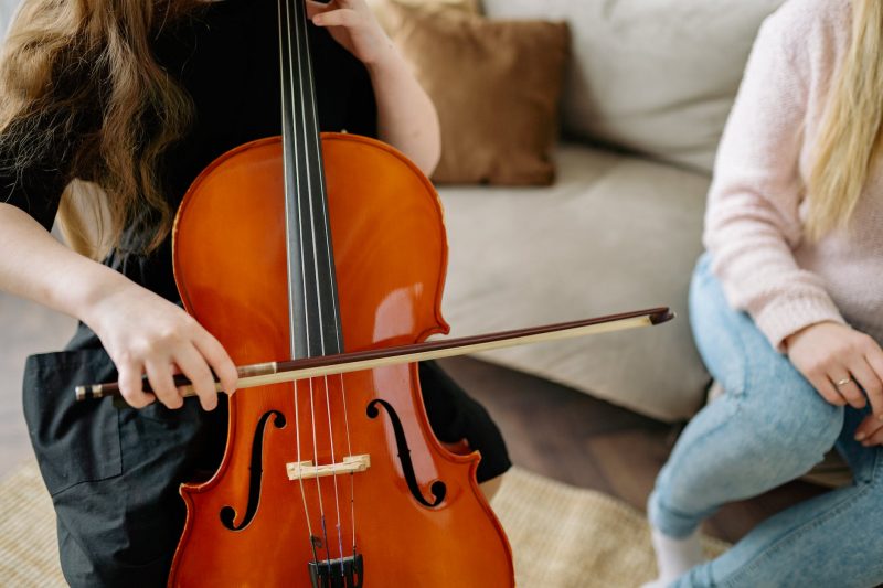 person playing cello